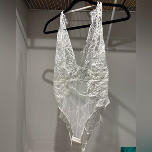Honey Birdette white lace body suit. May not have been worn. Size M.